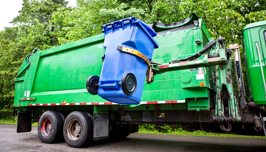waste-garbage-truck-robot-arm-lifting-can