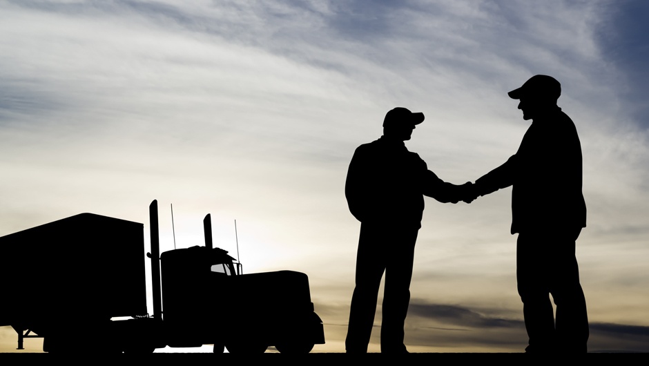 trucker-silhouette-shaking-hands